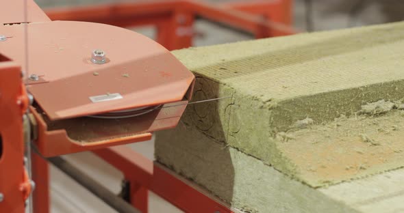 A Special Machine for the Cut Out of a Pipe Heater in Circles Is Working