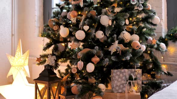 Christmas Decorations on Christmas Tree at Home, Gifts on Floor