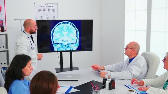 Expert Doctor Using Modern Technology During Medical Conference