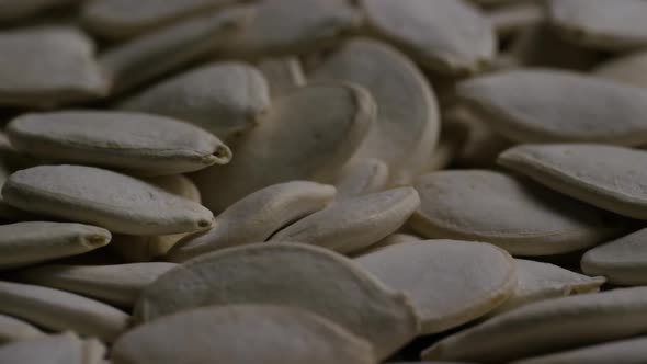 Cinematic, rotating shot of pumpking seeds - PUMPKIN SEEDS 039