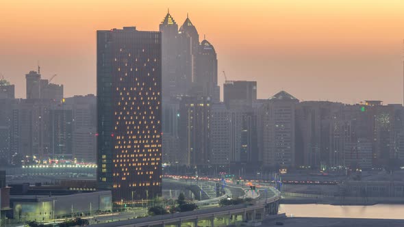 Buildings on Al Reem Island in Abu Dhabi Day to Night Timelapse From Above