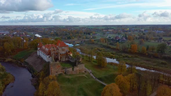 Bauska Medieval Castle Ruins Complex and Park From Above Aerial Shot 4K Video