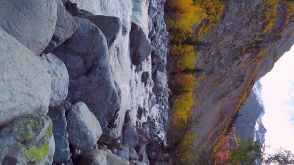 Mountain river in the autumn mountains. A turbulent current. Georgia, Svaneti.