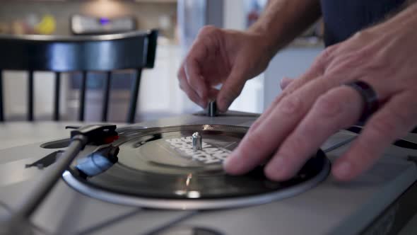 DJ scratching on a portable turntable