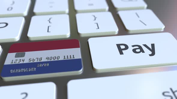 Bank Card Featuring Flag of the Netherlands As a Key on Keyboard alt