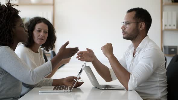 Cheerful Business Partners Shaking Hands.