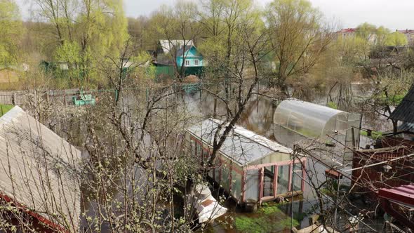 Vegetable Garden Beds In Water During Spring Flood Floodwaters During Natural Disaster