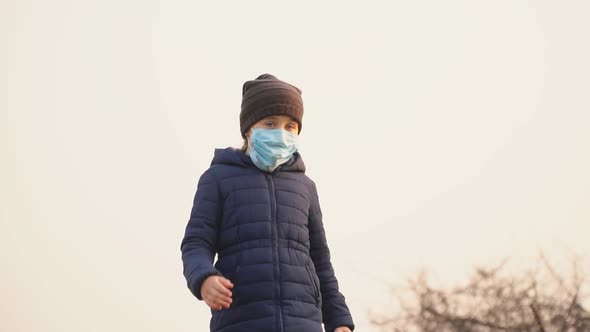 Child in Medical Mask