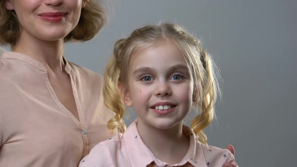 Portrait of Happy Girl and Mother, Children Rights, Care for Younger Generation