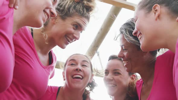 Female friends enjoying exercising at boot camp together