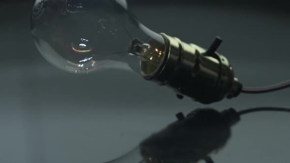 Light bulb falling on floor, Slow Motion