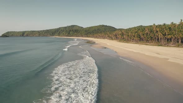 Waves Drop to Sand Sea Shore Aerial