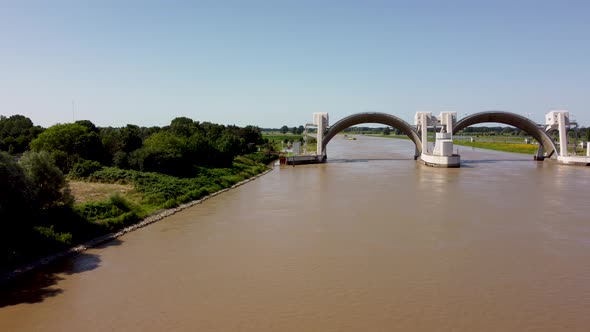 Lock and weir In Dutch River Lek Called Sluice Hagestein, aerial