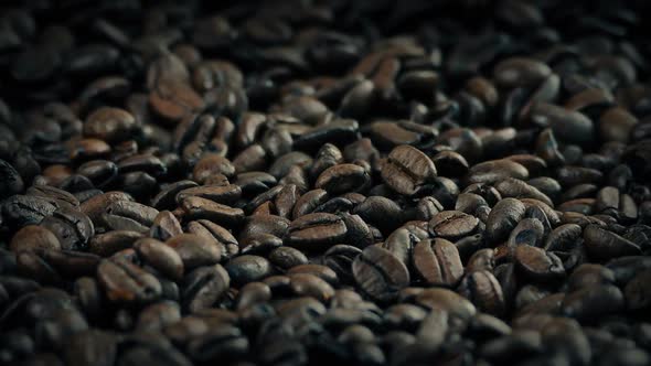 Roasted Coffee Beans In Sack Rotating Slowly