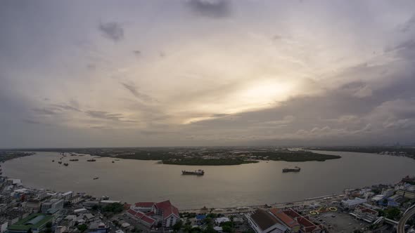 Timelapse day to night Curving the Chao Phraya river.