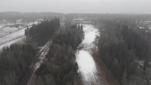 Global Warming With Less Snow on Ski Slope Scandinavia Pull Back Aerial