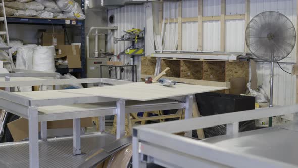 Metal sheets and equipment in a workshop