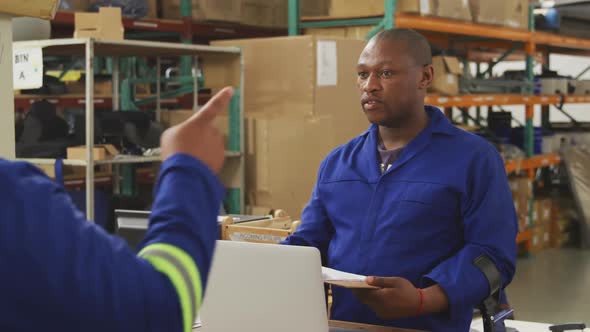 Boss giving instructions to a worker