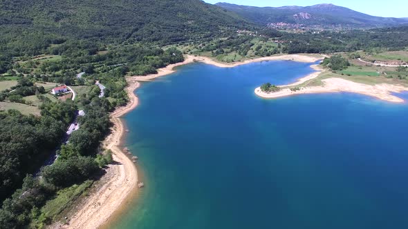 Flying above beautiful landscape of artificial lake of Peruca, Croatia