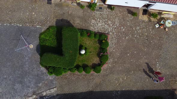 Small accurate garden on a farmGorgeous aerial view flight bird's eye view drone footageat Country