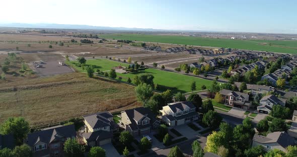 A flight over suburban Colorado while new homes are built in the background.