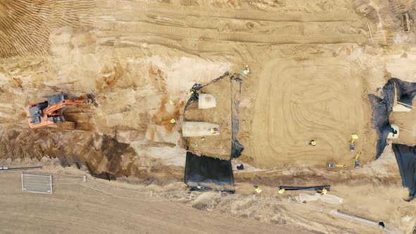 Aerial view of a working excavator in the mine. Industrial