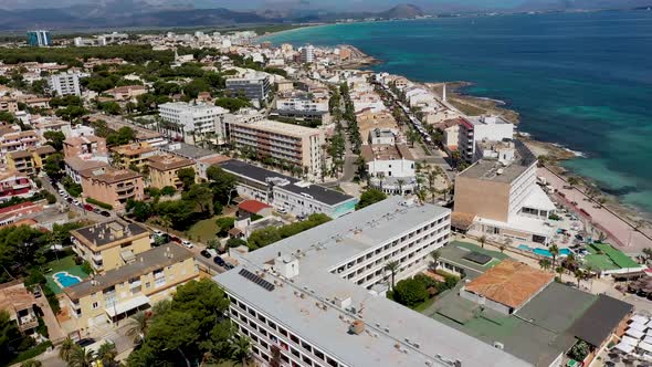 Aerial drone footage of the beach front on the Spanish island of Majorca Mallorca, Spain