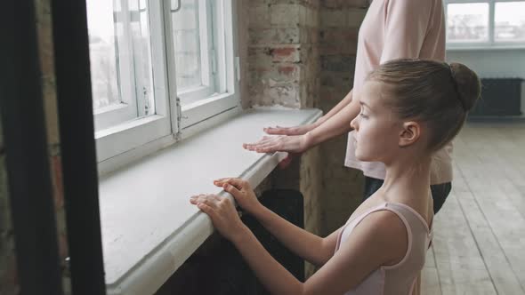 Pretty Little Girl Training At Ballet Class