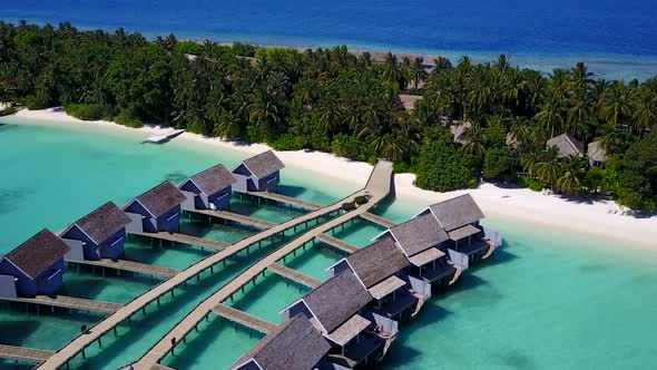 Aerial drone landscape of tropical shore beach trip by blue ocean with sand background