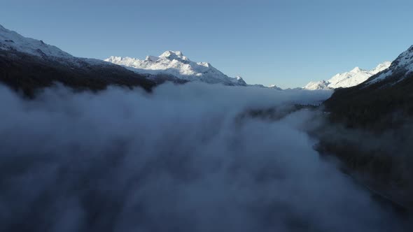 Fog over lake, St. Moritz, Canton of Graubunden, Switzerland