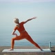 Sports Woman Doing Yoga in the Morning Stretching - VideoHive Item for Sale