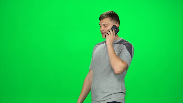 Attractive Guy Goes and Talks on the Phone, Chroma Key