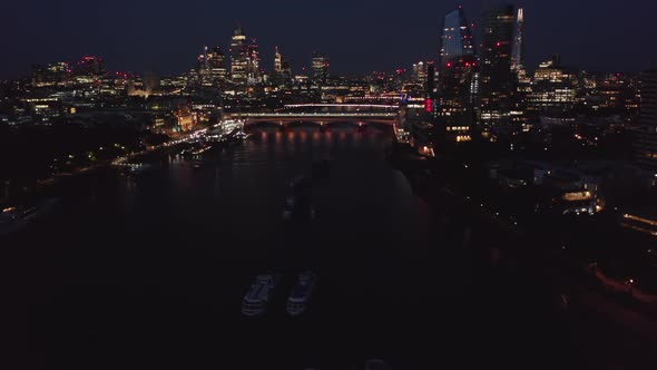 Tilt Up Reveal of City Centre at Night