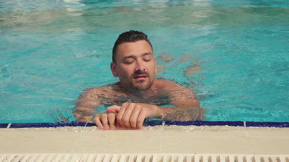 Man in Swimming Pool