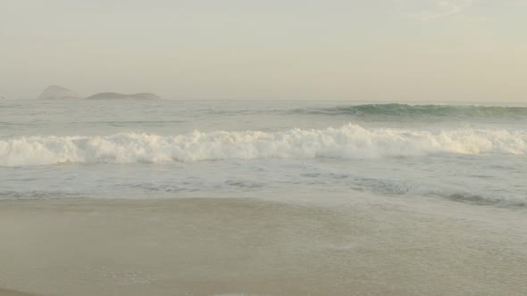 Waves crashing on Ipanema beach