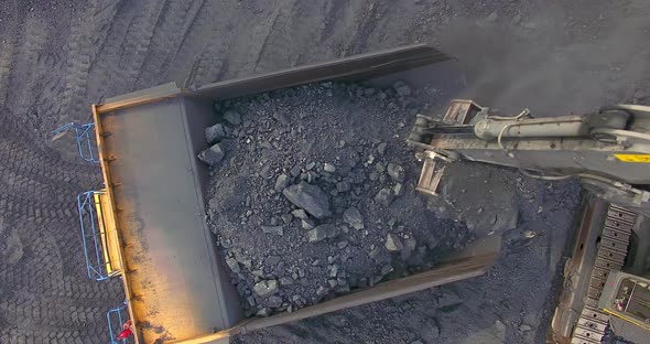 Top View Excavator Loads Coal 