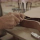 Luthier filing a guitar mold - VideoHive Item for Sale