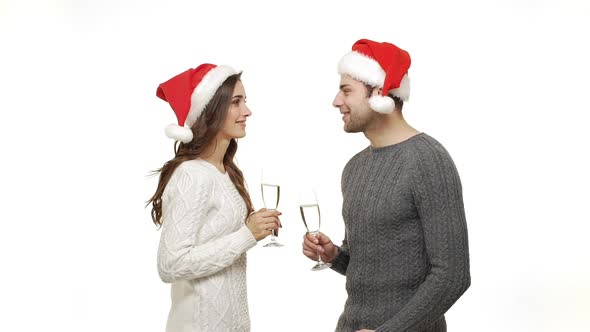 Slow-motion Young Couple Enjoy Drinking Champagne Celebrate for Christmas Fun Together Feeling