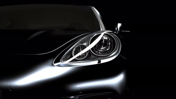 the black car gradually emerges from the darkness due to the illumination alt