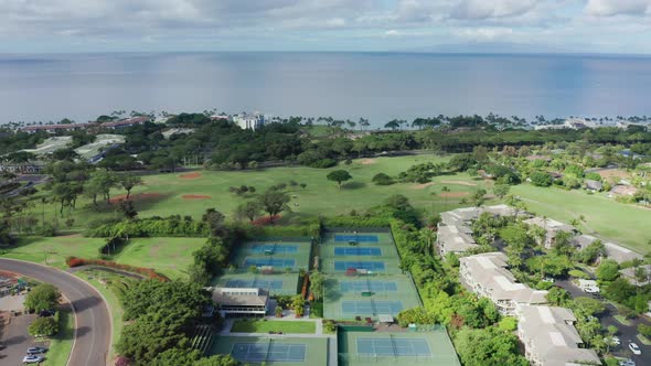 Aerial View of Tennis and Golf Courses in Sport Club on Tropical Island Hawaii