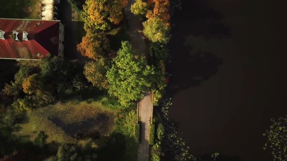 Beautiful aerial view of castle in autumn season. Popular palace and travel destination. Aerial shot