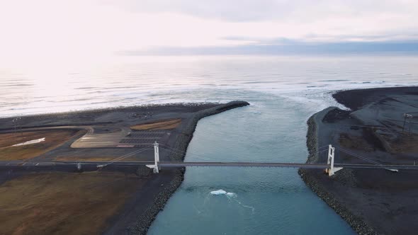 Drone Over Suspension Bridge Near Diamond Beach