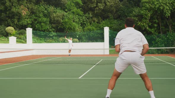 Tennis players playing a point