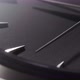 Extreme Closeup of Arrow Running on Black Clock Face - VideoHive Item for Sale