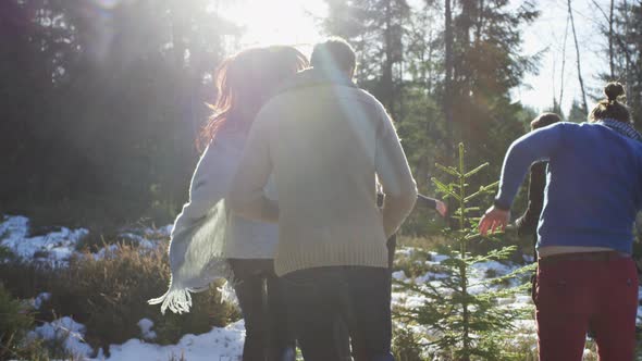 People running on a field during winter