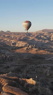 Vertical Video of Hot Air Balloons Flying in the Sky Over Cappadocia Turkey