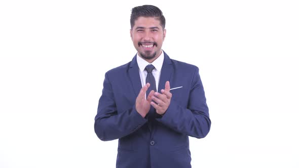 Happy Bearded Persian Businessman Clapping Hands