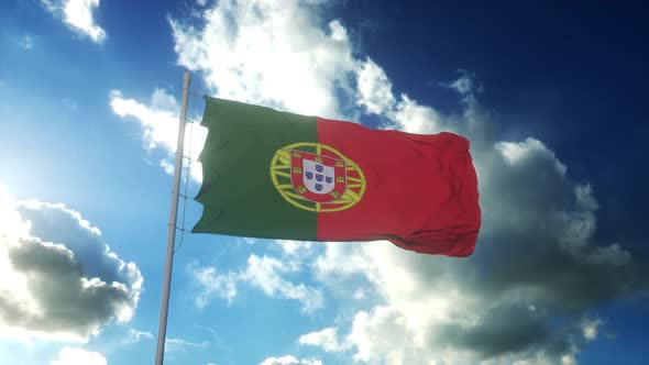 Flag of Portugal Waving at Wind Against Beautiful Blue Sky