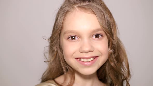 Portrait of a little girl with big beautiful eyes