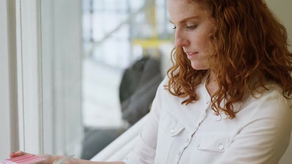 Businesswoman busy selecting color shades out of color palate 4k